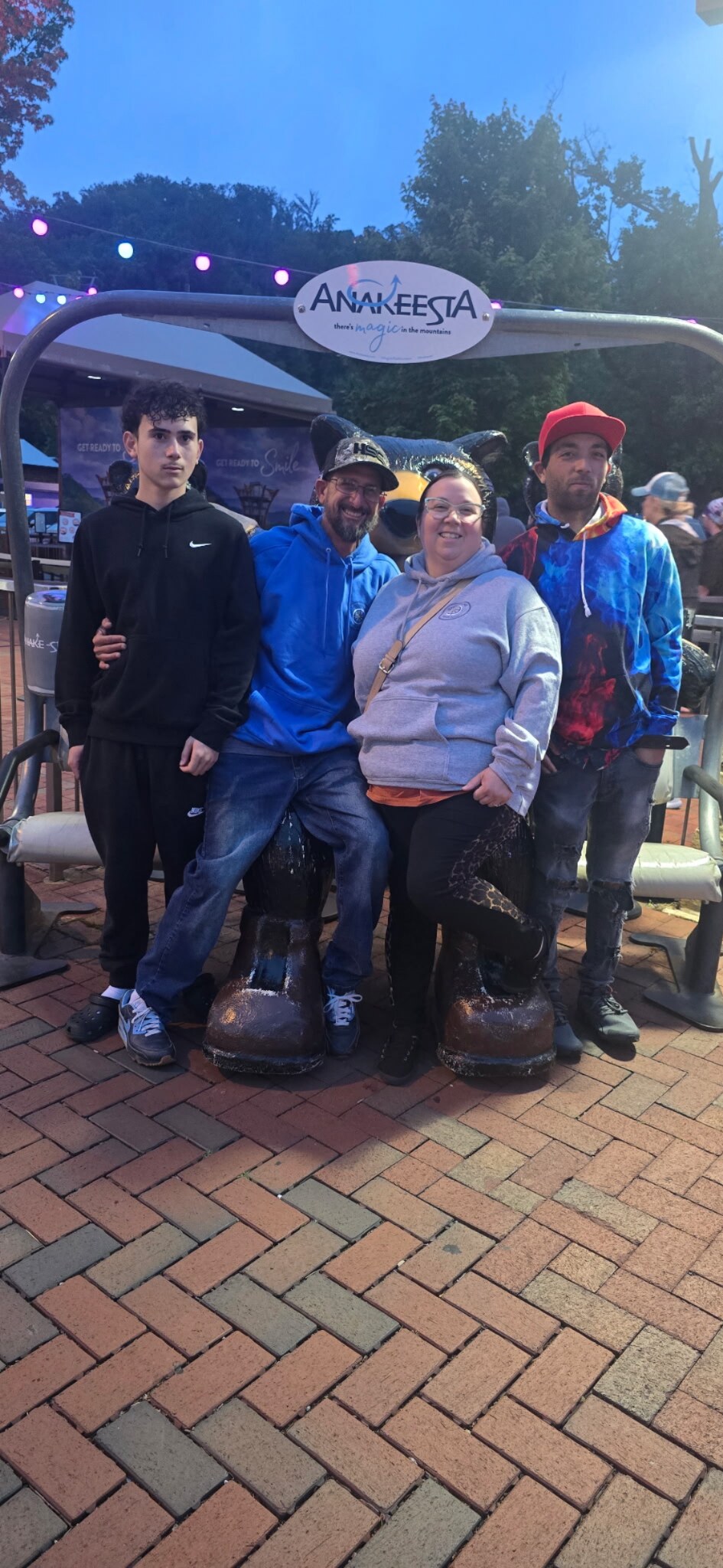 Little Brandon, Brandon, Rachel, and Tristin standing together