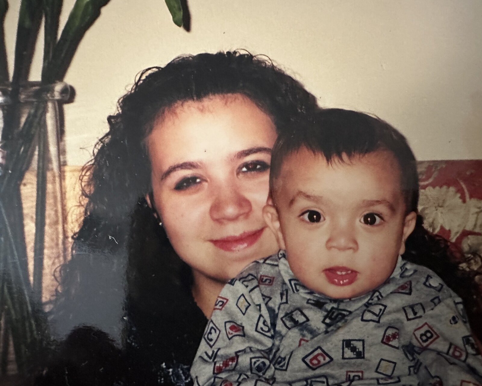 Rachel holding Tristin as a baby
