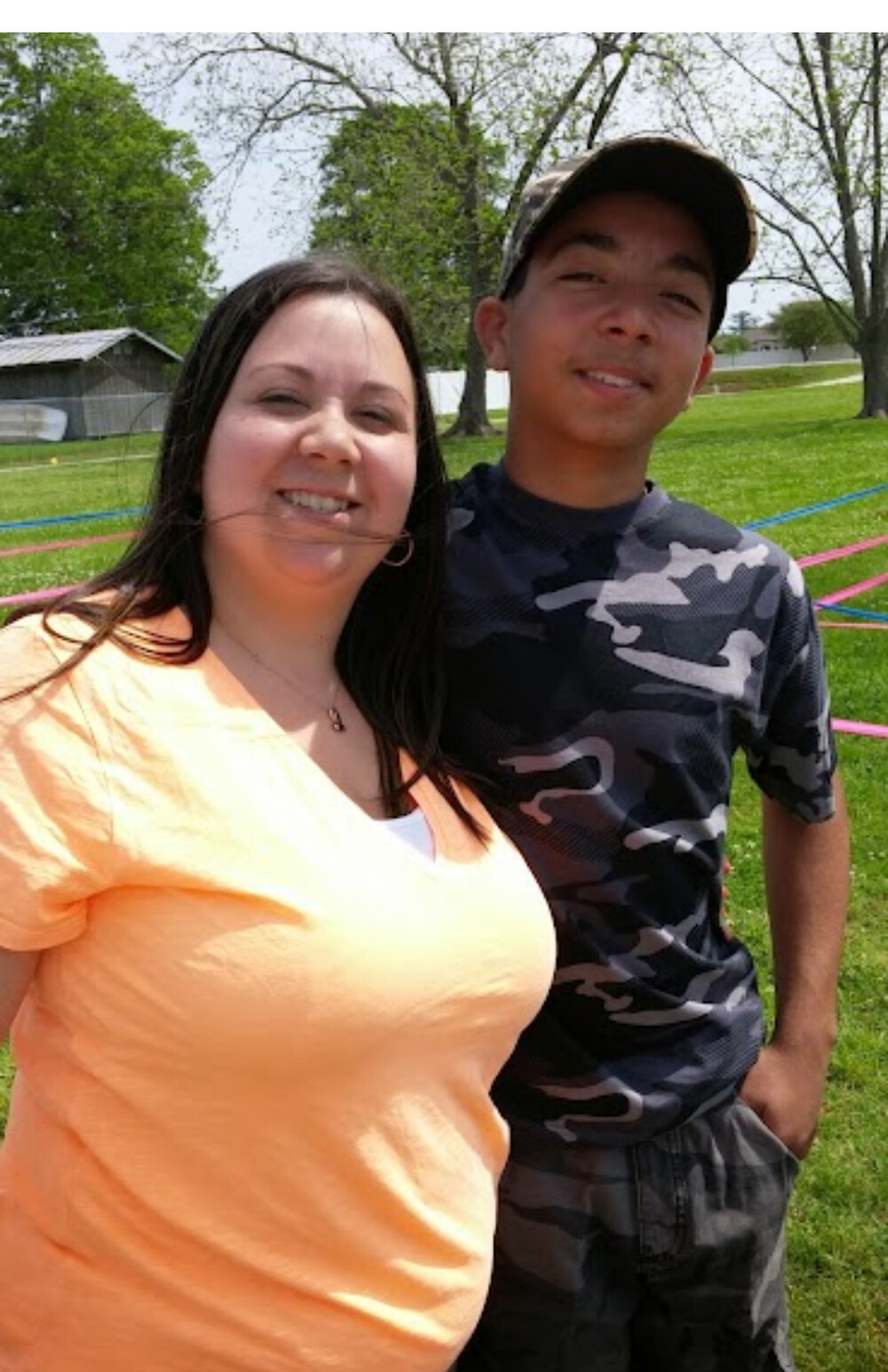 Rachel standing beside Tristin outdoors