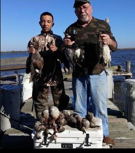 Tristin hunting beside his paternal grandfather, Jimmy