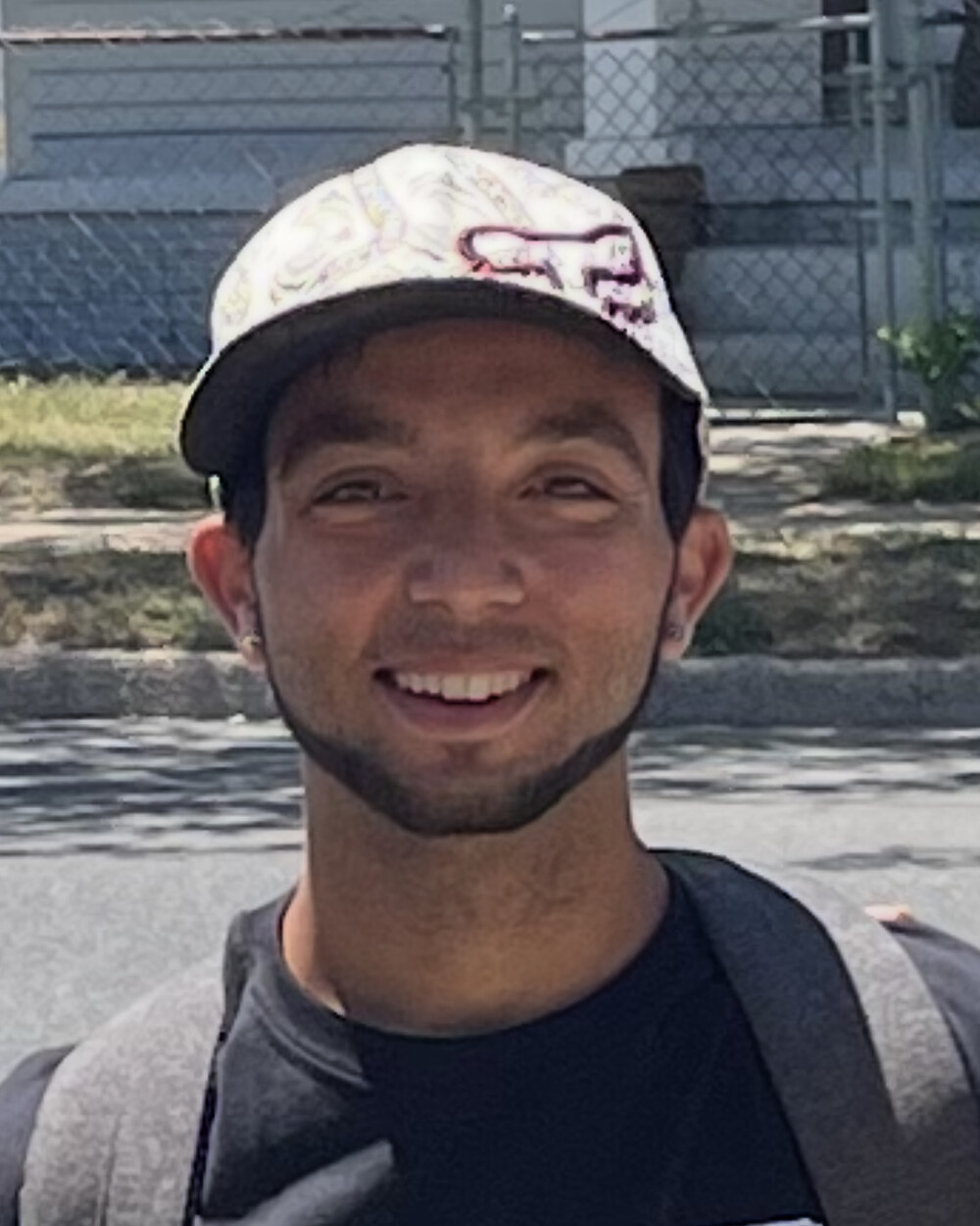 Tristin smiling as a young man